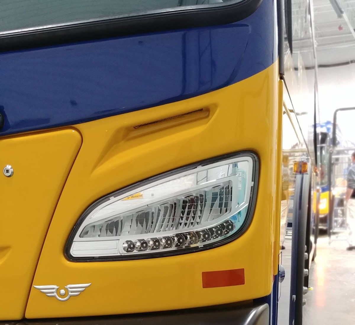 New Flyer transit bus LED headlight assembly on the production line